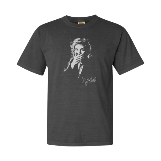 A dark grey t-shirt featuring a front screen print of Daryl Hall with his hand to his mouth, and his signature below the image.